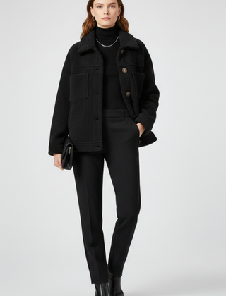 Black women’s fleece jacket by THE WHITMORE FAMILY with buttons and large front pockets, cozy and casual outerwear for women.
