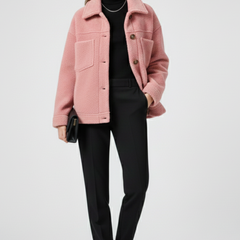 Black women’s fleece jacket by THE WHITMORE FAMILY with button closures and large front pockets, cozy and stylish outerwear.