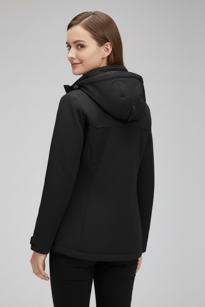 Women’s hooded jacket with zipper by THE WHITMORE FAMILY, shown in a stylish design with a front zipper and hood.