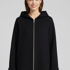 Women’s hooded jacket with zip closure and front pockets, stylishly designed by THE WHITMORE FAMILY for women.