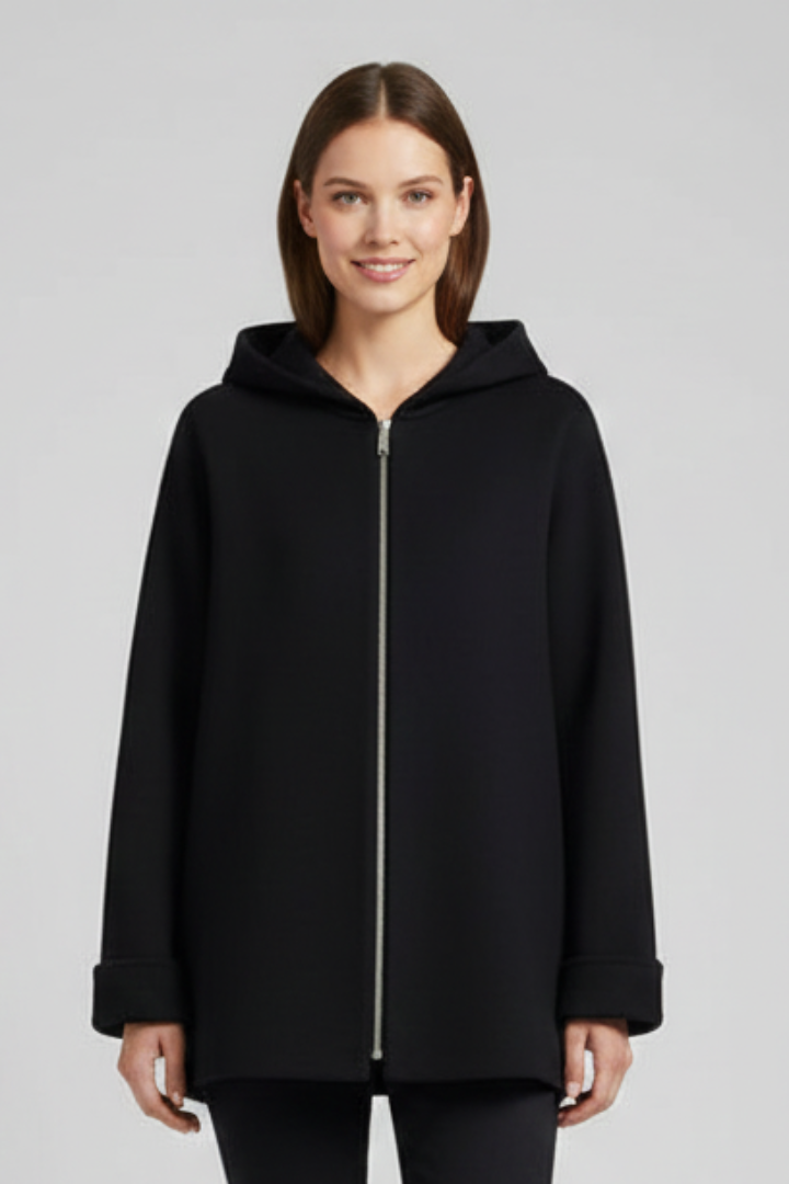 Women’s hooded jacket with zip closure and front pockets, stylishly designed by THE WHITMORE FAMILY for women.