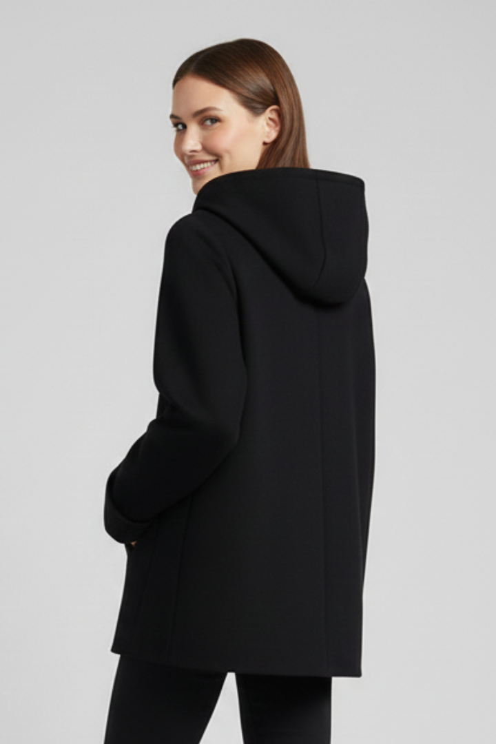 Women's hooded jacket with zip closure and side pockets, stylish outerwear from THE WHITMORE FAMILY.
