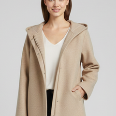 Women’s hooded jacket with zip closure and front pockets, stylish and warm, by THE WHITMORE FAMILY.