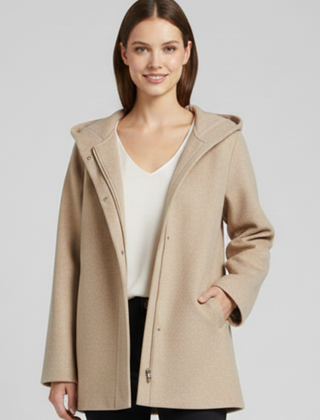 Women’s hooded jacket with zip closure and front pockets, stylish and warm, by THE WHITMORE FAMILY.