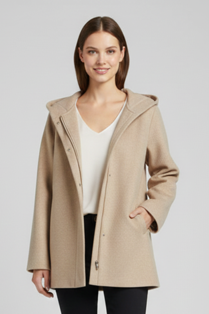 Women’s hooded jacket with zip closure and front pockets, stylish and warm, by THE WHITMORE FAMILY.