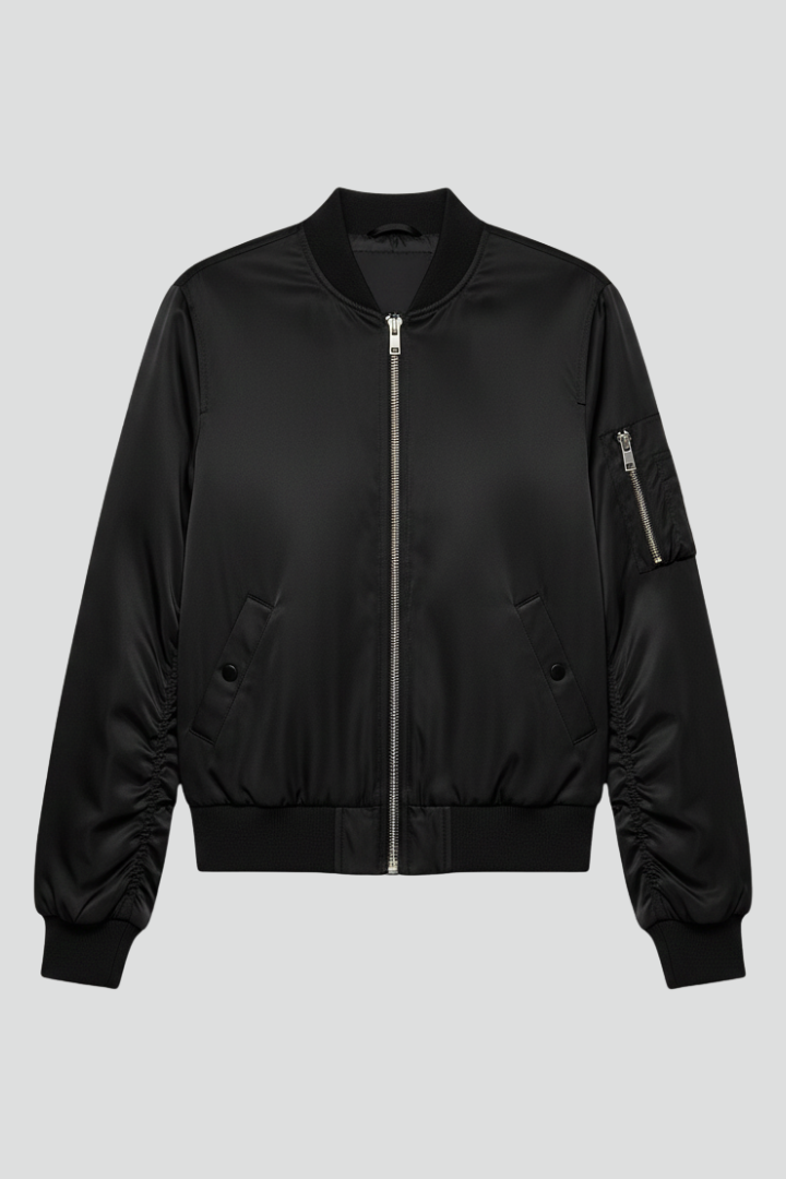 Women’s bomber jacket by THE WHITMORE FAMILY featuring zipper closure and ribbed details, stylish and casual outerwear for women.