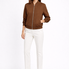 Black women’s bomber jacket with zip closure and ribbed edges, stylish women’s jacket by THE WHITMORE FAMILY.