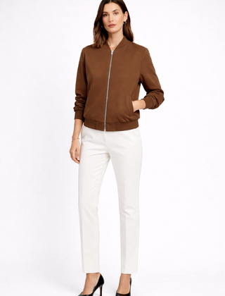 Black women’s bomber jacket with zip closure and ribbed edges, stylish women’s jacket by THE WHITMORE FAMILY.