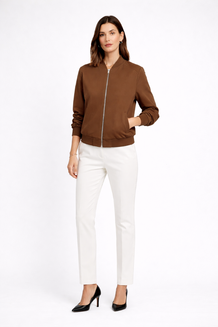 Black women’s bomber jacket with zip closure and ribbed edges, stylish women’s jacket by THE WHITMORE FAMILY.