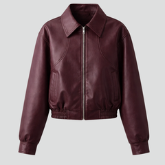 Women's burgundy bomber jacket by THE WHITMORE FAMILY featuring zip closure and elasticated hem, casual and stylish outerwear.