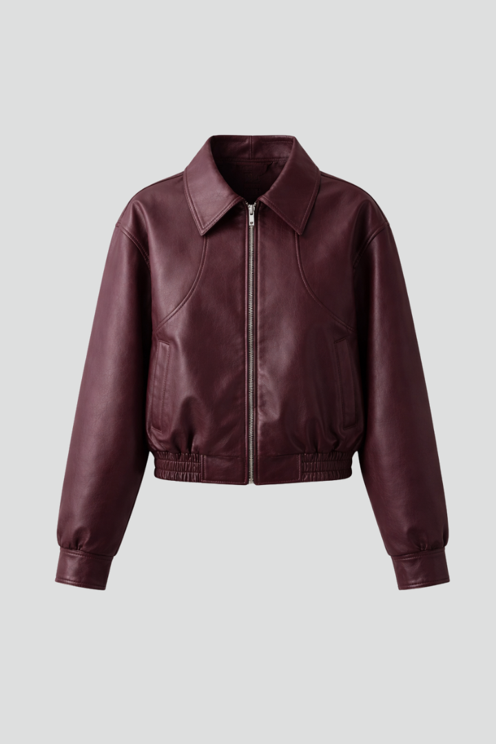 Women's burgundy bomber jacket by THE WHITMORE FAMILY featuring zip closure and elasticated hem, casual and stylish outerwear.