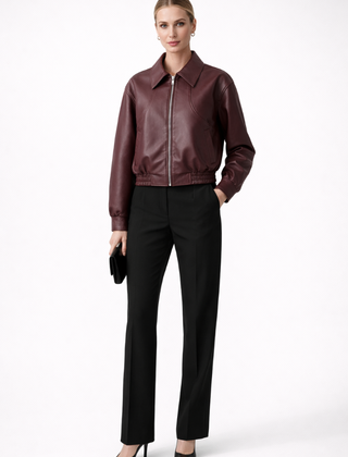 Women’s burgundy bomber jacket by THE WHITMORE FAMILY with zip closure and elasticated hem, stylish women's jacket for casual wear.