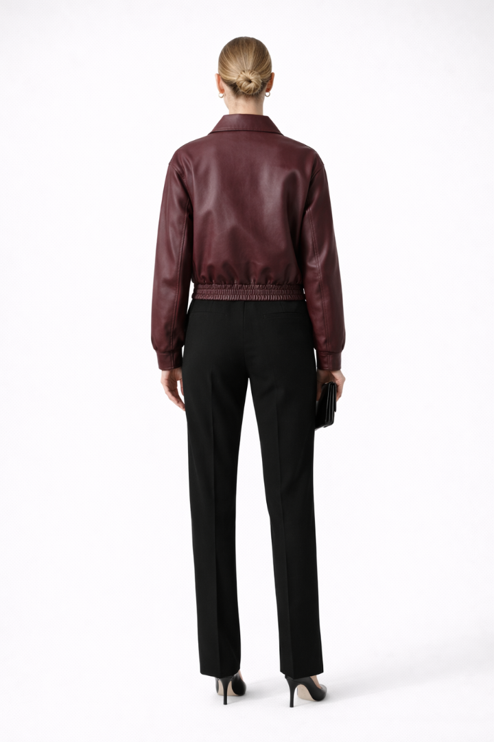Women's burgundy bomber jacket by THE WHITMORE FAMILY with zip closure and elasticated hem, stylish and casual outerwear.