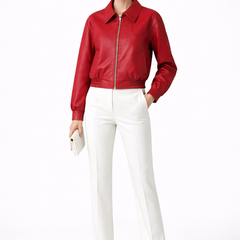 Women's burgundy bomber jacket by THE WHITMORE FAMILY with zip closure and elasticated hem, casual outerwear for women.
