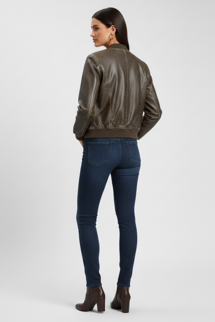 Women's bomber jacket with collared neck and woven outer surface by THE WHITMORE FAMILY, in a coffee color.