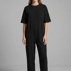 Women’s jumpsuit with round neck and wide-leg trousers from THE WHITMORE FAMILY, stylish and comfortable for casual wear.