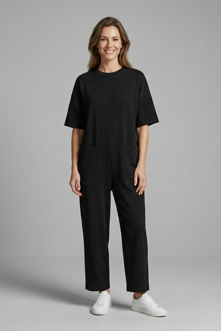 Women’s jumpsuit with round neck and wide-leg trousers from THE WHITMORE FAMILY, stylish and comfortable for casual wear.