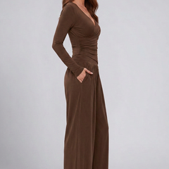 Women's lounge set by THE WHITMORE FAMILY featuring a wrap top and wide-leg pants, styled for comfort and casual wear.
