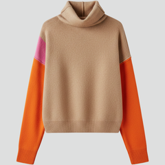 Women’s knit sweater with high collar and ribbed cuffs, from THE WHITMORE FAMILY, showcasing a cozy, stylish winter top.