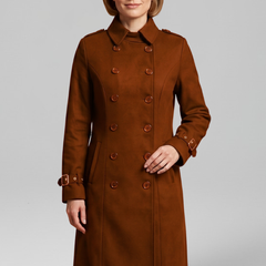 Women's long black coat by THE WHITMORE FAMILY with double-breasted buttons and long sleeves, stylish winter outerwear.