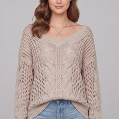 Women's oversized sweater with long sleeves and ribbed cuffs, in soft knit fabric, by THE WHITMORE FAMILY.
