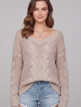 Women's oversized sweater with long sleeves and ribbed cuffs, in soft knit fabric, by THE WHITMORE FAMILY.
