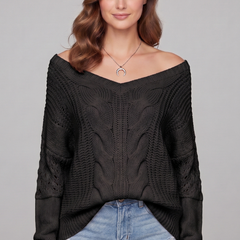 Women’s oversized sweater with long sleeves and ribbed cuffs, stylish and cozy, by THE WHITMORE FAMILY.