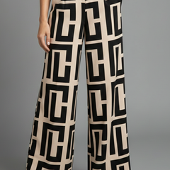 Women’s Palazzo Trousers by THE WHITMORE FAMILY featuring dark brown fabric, graphic print, and wide-leg style.