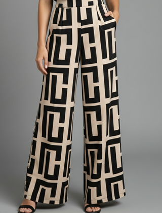 Women’s Palazzo Trousers by THE WHITMORE FAMILY featuring dark brown fabric, graphic print, and wide-leg style.