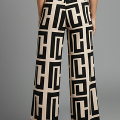 Women’s Palazzo Trousers with graphic print and wide legs by THE WHITMORE FAMILY in dark brown, stylish and comfortable for casual wear.