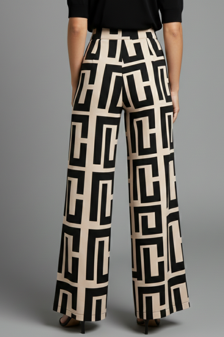 Women’s Palazzo Trousers with graphic print and wide legs by THE WHITMORE FAMILY in dark brown, stylish and comfortable for casual wear.