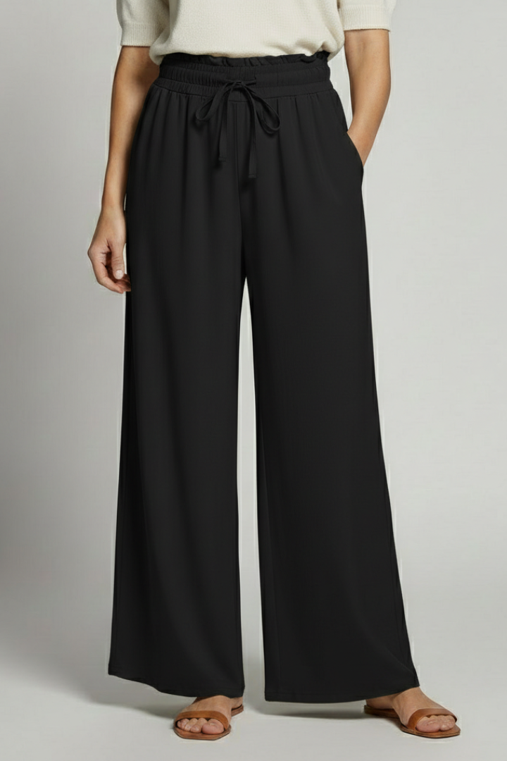 Women’s Palazzo Trousers with elastic waist and side pockets, stylish and comfortable pants by THE WHITMORE FAMILY.