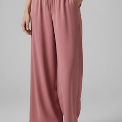 Pink women's Palazzo trousers with elastic waist and side pockets by THE WHITMORE FAMILY, comfortable and stylish for everyday wear.