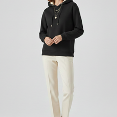 Women’s THE WHITMORE FAMILY pullover hoodie with sherpa lining and ribbed cuffs, cozy and stylish for cold weather.