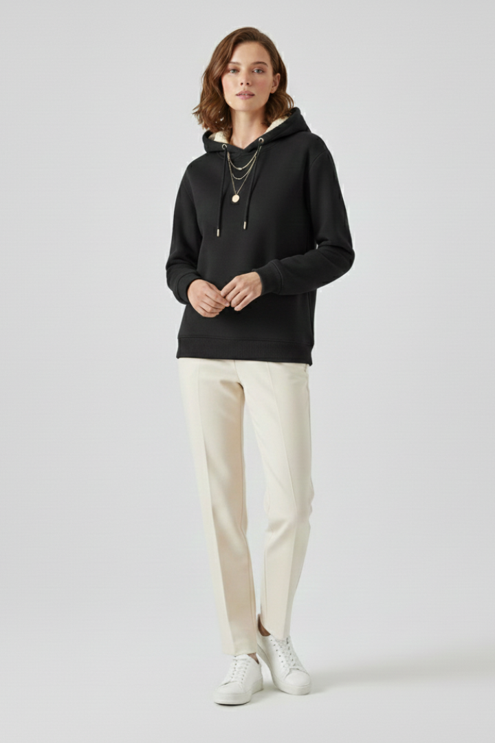 Women’s THE WHITMORE FAMILY pullover hoodie with sherpa lining and ribbed cuffs, cozy and stylish for cold weather.