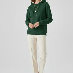 Women's hoodie pullover by THE WHITMORE FAMILY with sherpa lining and ribbed cuffs, cozy and stylish winter sweater.