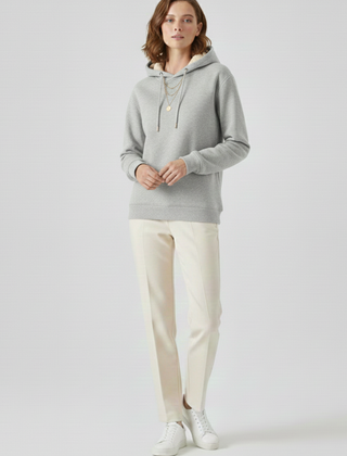 Women’s pullover hoodie by THE WHITMORE FAMILY with sherpa lining and ribbed cuffs, cozy and warm for winter wear.