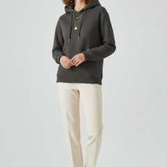 Women's hoodie pullover by THE WHITMORE FAMILY with sherpa lining and ribbed cuffs, featuring a cozy and stylish design.
