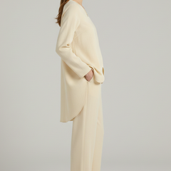 Women’s shirt and trousers set by THE WHITMORE FAMILY, featuring long sleeves and straight-leg design, casual and stylish outfit.