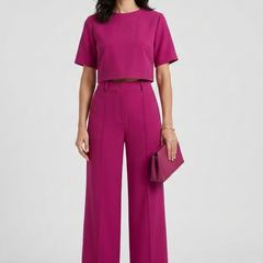 Women’s two-piece set with short sleeve top and wide-leg trousers, stylish and comfortable outfit by THE WHITMORE FAMILY.