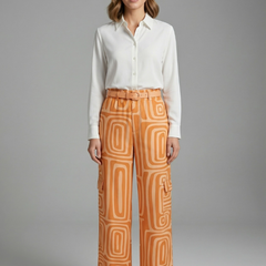Women’s shirt and trousers set by THE WHITMORE FAMILY, featuring button closure and straight-leg design, casual and stylish.