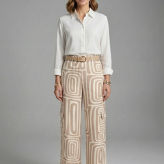 Women’s shirt and trousers set by THE WHITMORE FAMILY, featuring button closure and straight-leg design, casual and stylish for women.