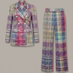 Women’s suit set featuring a double-breasted blazer and wide-leg trousers by THE WHITMORE FAMILY, styled for a professional look.