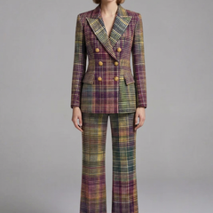Women’s suit set by THE WHITMORE FAMILY featuring a double-breasted blazer and wide-leg trousers, styled for a polished professional look.