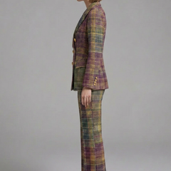 Women’s suit set featuring a double-breasted blazer and wide-leg trousers by THE WHITMORE FAMILY, shown in a stylish professional look.
