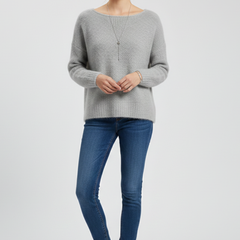 Women’s sweater by THE WHITMORE FAMILY featuring a wide neckline and soft brushed knit surface, shown in a cozy fit.