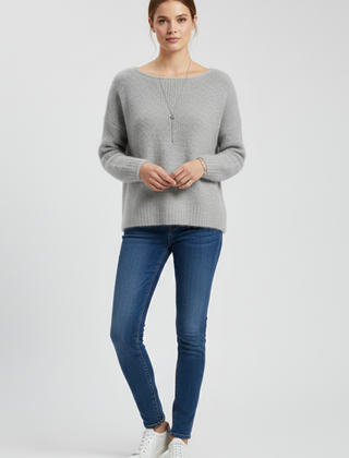 Women’s sweater by THE WHITMORE FAMILY featuring a wide neckline and soft brushed knit surface, shown in a cozy fit.