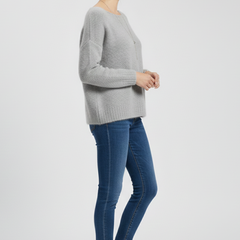 Women's sweater with wide neckline and brushed knit surface by THE WHITMORE FAMILY, featuring a cozy, stylish design.