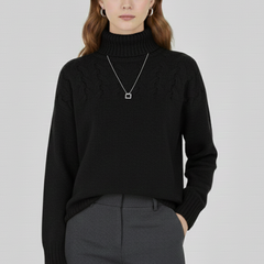 Women’s sweater with turtleneck and textured cable pattern, from THE WHITMORE FAMILY, showing cozy knit fabric and stylish design.