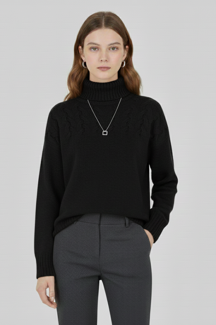 Women’s sweater with turtleneck and textured cable pattern, from THE WHITMORE FAMILY, showing cozy knit fabric and stylish design.